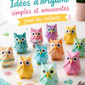 Enfants créant des œuvres d'origami colorées ensemble