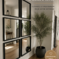Miroir noir élégant accroché au mur dans un intérieur moderne