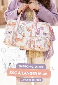Un joli sac à langer cousu main avec des motifs colorés, idéal pour les mamans modernes.
