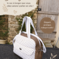 Sac à langer Boogie présenté sur une table avec des accessoires de maternité