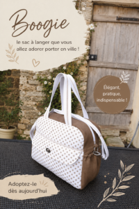 Sac à langer Boogie présenté sur une table avec des accessoires de maternité