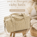 Sac à langer vichy lurex sur une table, prêt pour une sortie familiale.