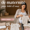 Valise de maternité ouverte avec des vêtements pour maman et bébé
